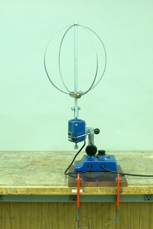 Balls on rotating hoops