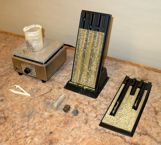 Hot metal slugs on wax slide Hot metal slugs on wax slide