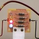 Board with green LED barely lit