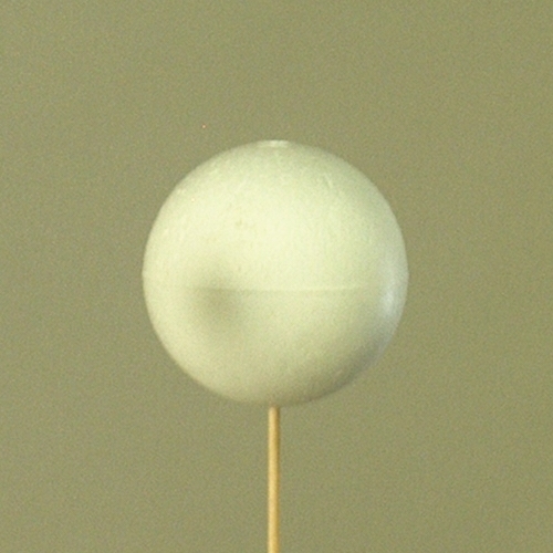 Close-up of solar eclipse, normal room light